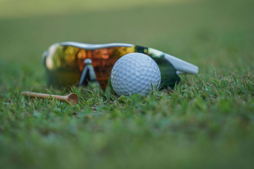 Sunglasses for golf on a golf course