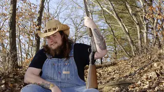 man using hillbilly slang in the backwoods