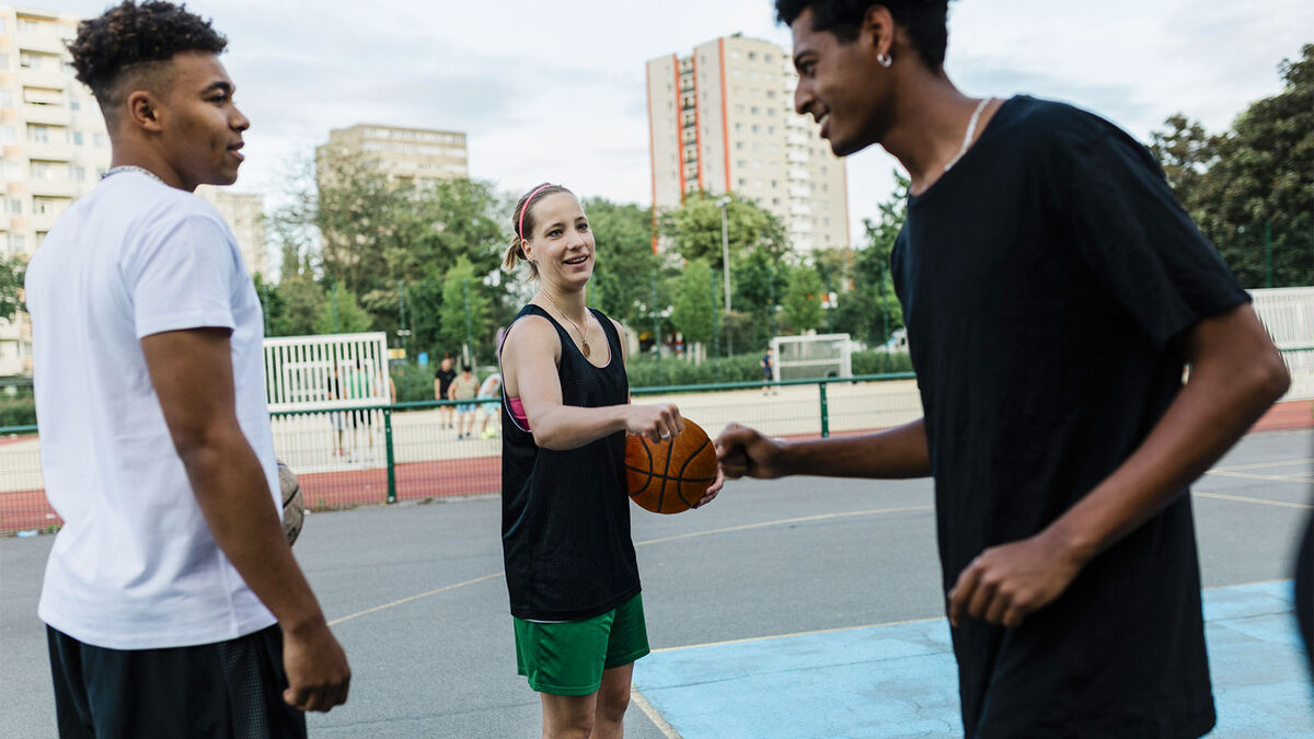 friends playing basketball talking slang