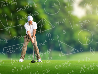 Golfer calculating equations at address with driver