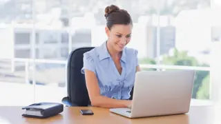 woman writing brief document computer