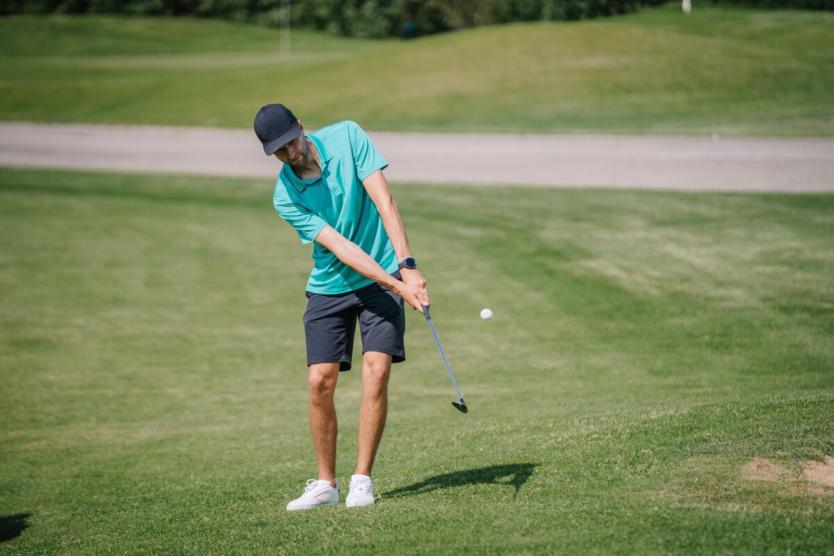 Golfer chipping from inside 50 yards
