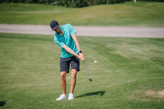 Golfer chipping from inside 50 yards