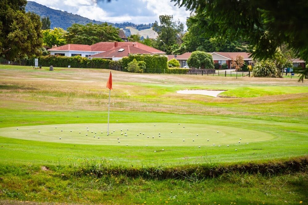 Practice chipping green with dozens of balls