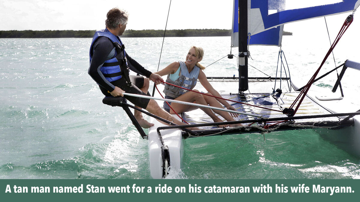 Man on catamaran with his wife Maryann