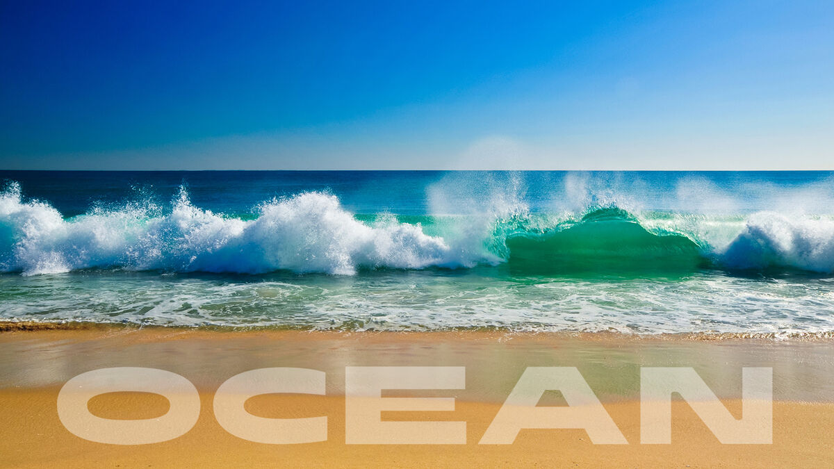 Ocean waves breaking on beach