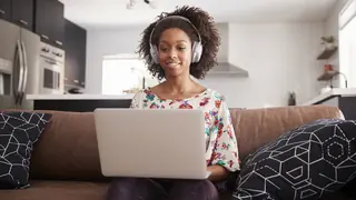Woman writing dialogue on computer