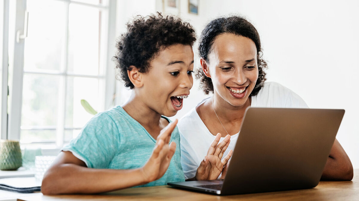 family using laptop computer