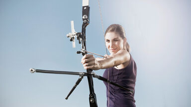 woman archer aiming a bow