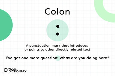 definition of colon symbol in grammar with example sentence from the article