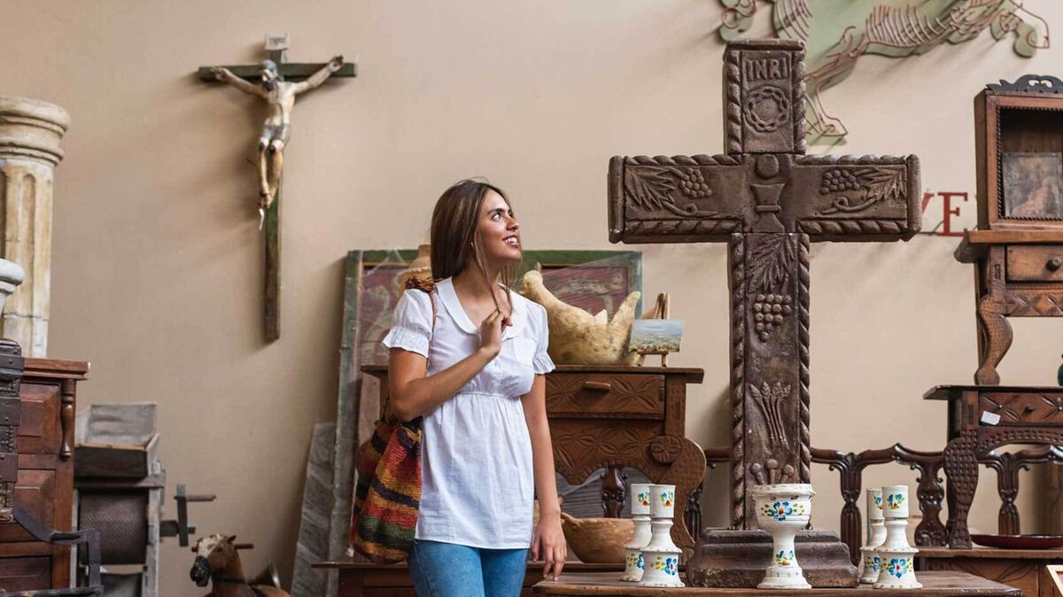 woman shops for crosses iconography example