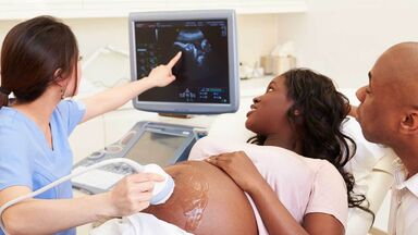 pregnant woman having 4D ultrasound test scan