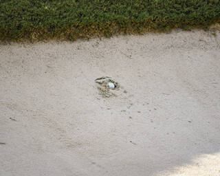Plugged ball in bunker