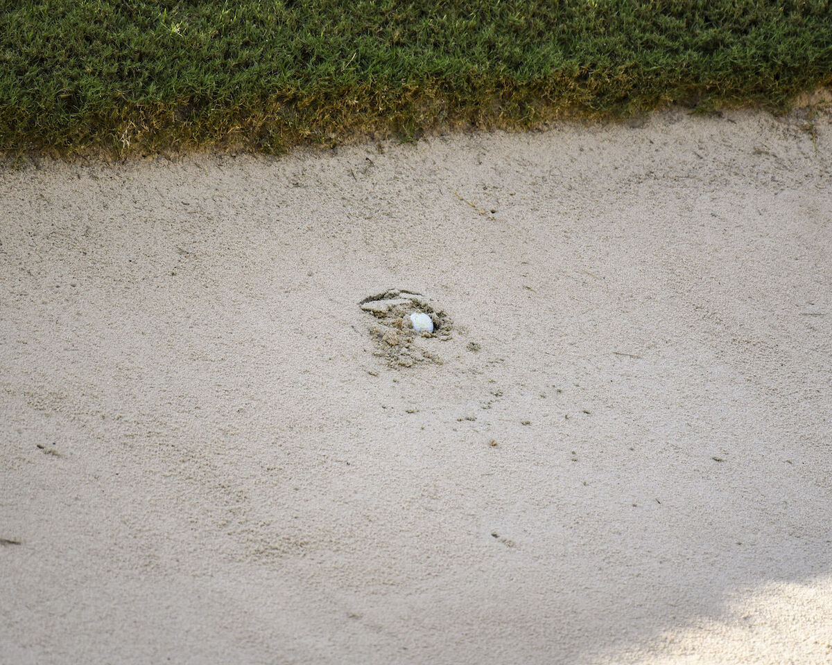 Plugged ball in bunker