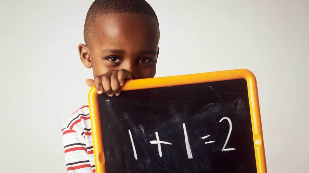 young boy using semantic memory for math problem