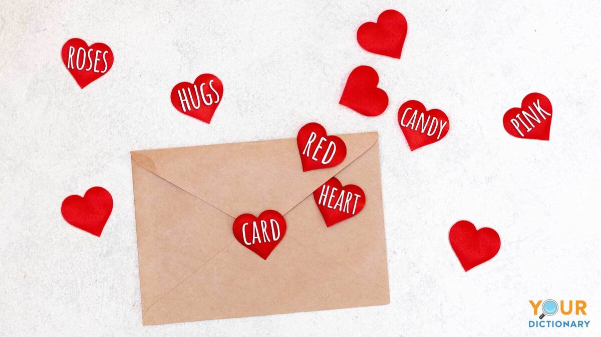 valentine words on heart cutouts with envelope