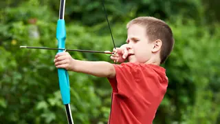 Boy archer with bow and arrow