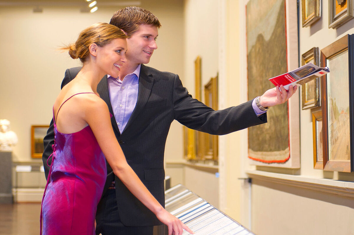 Couple looking at art in museum