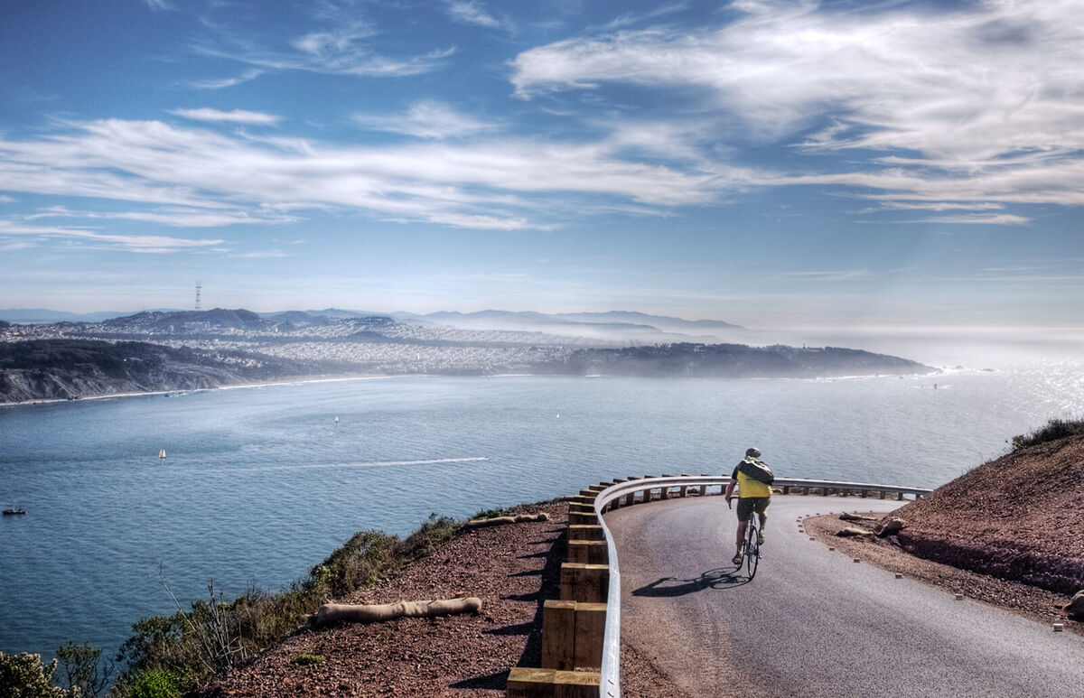 Lone biker turning corner