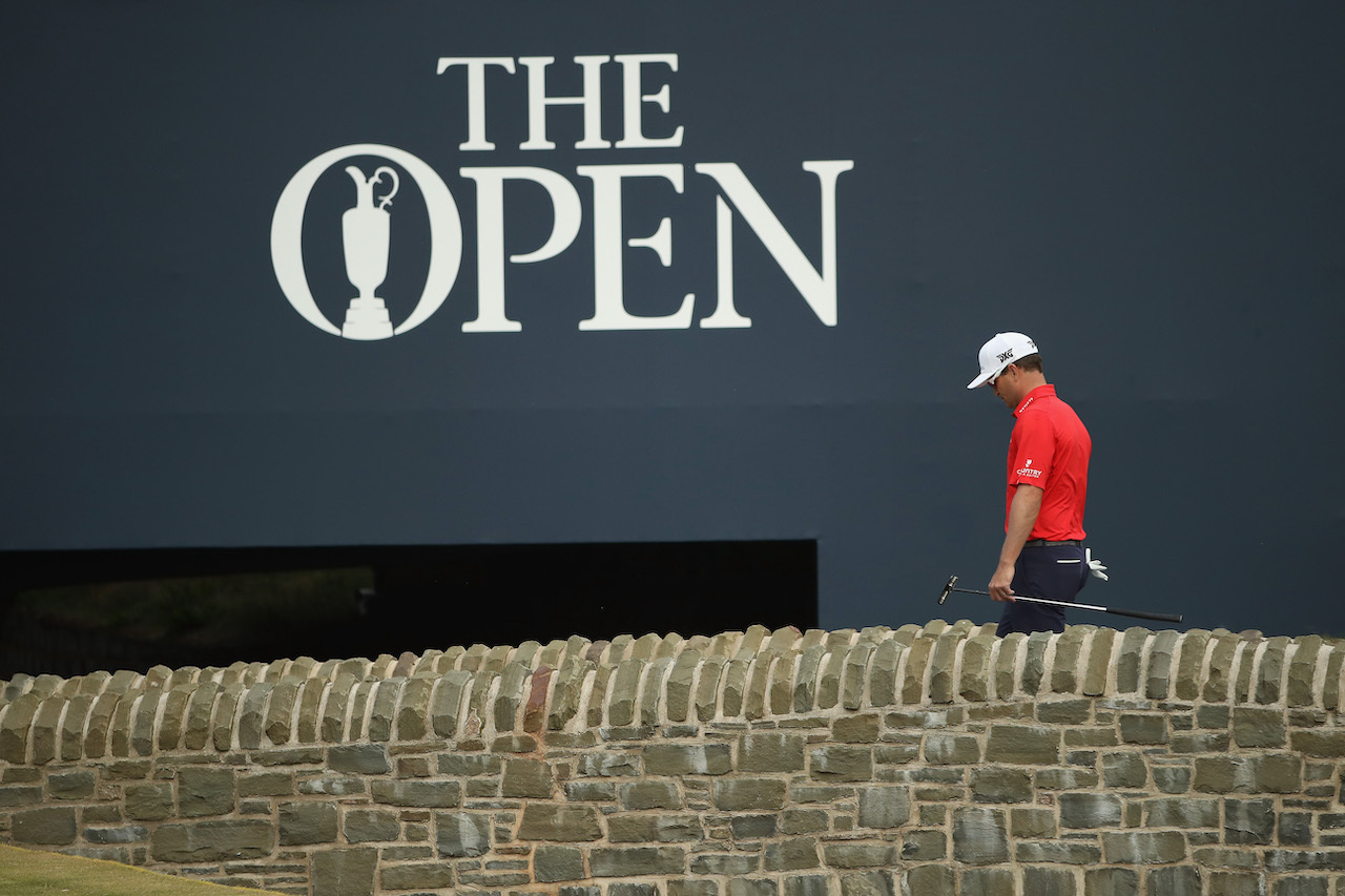 Zach Johnson hangs his head at the Open