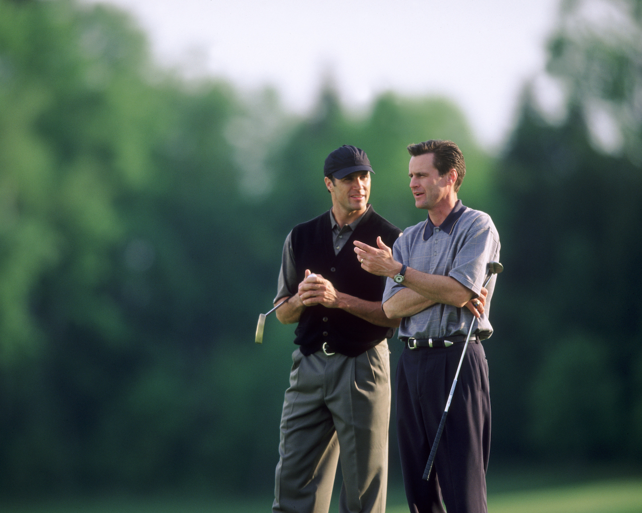 Golfers chatting on the course