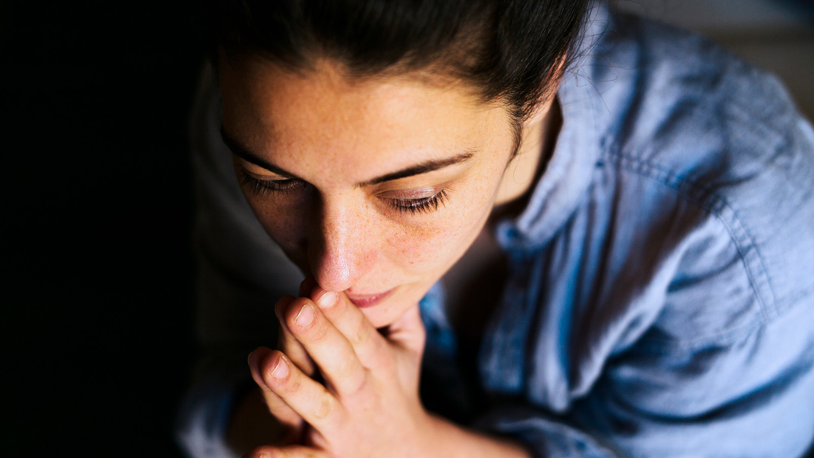 thoughtful sad woman represents darkness